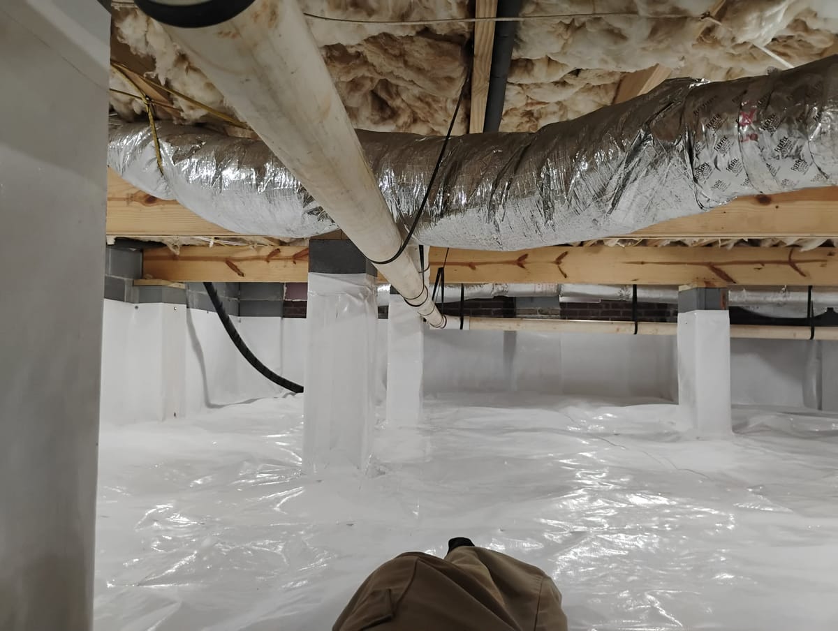 Crawl Space with Insulation and Ductwork