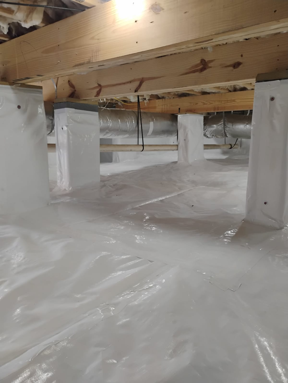 Crawl Space with Vapor Barrier and Ductwork