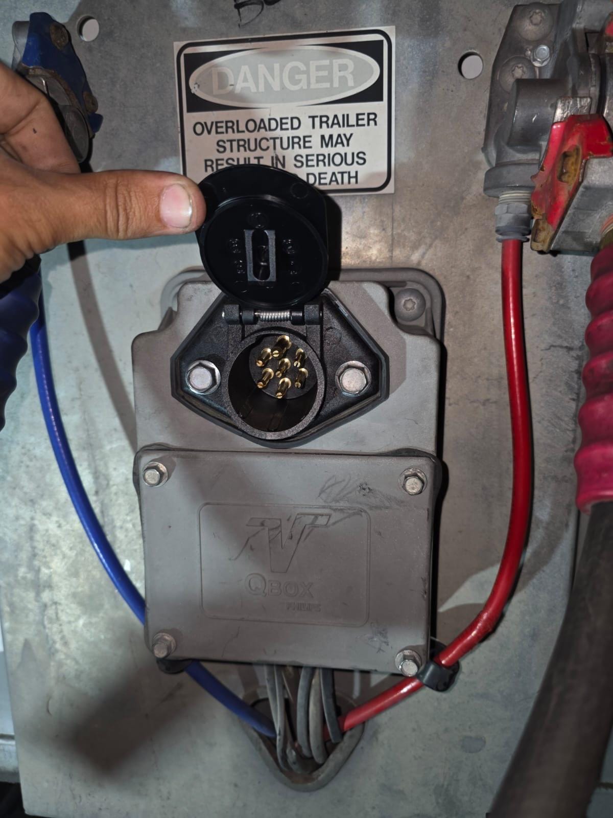 Hand Opening Electrical Connector Box on Trailer with Warning Sign for Overload Risk