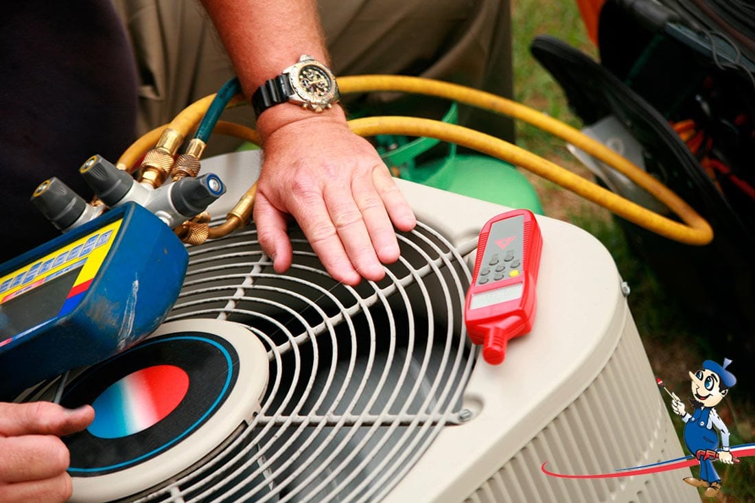 Technician Performing Maintenance on Outdoor Air Conditioning Unit with Pressure Gauge and Handheld Temperature Reader