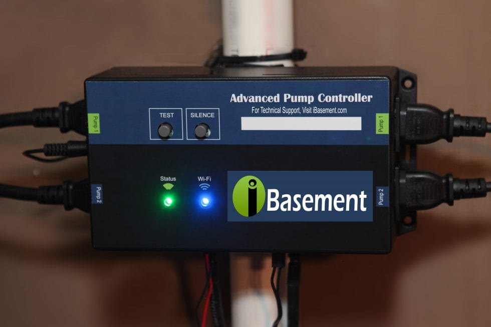 Advanced Pump Controller Device with Dual Pump Connectivity and LED Status Indicators Mounted on a Pipe with iBasement Branding and Test and Silence Buttons